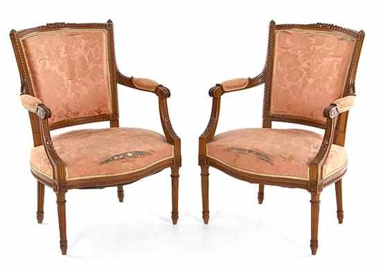 Appraisal: Pair Louis XVI carved fruitwood bergeres th century bead-and-channel frame