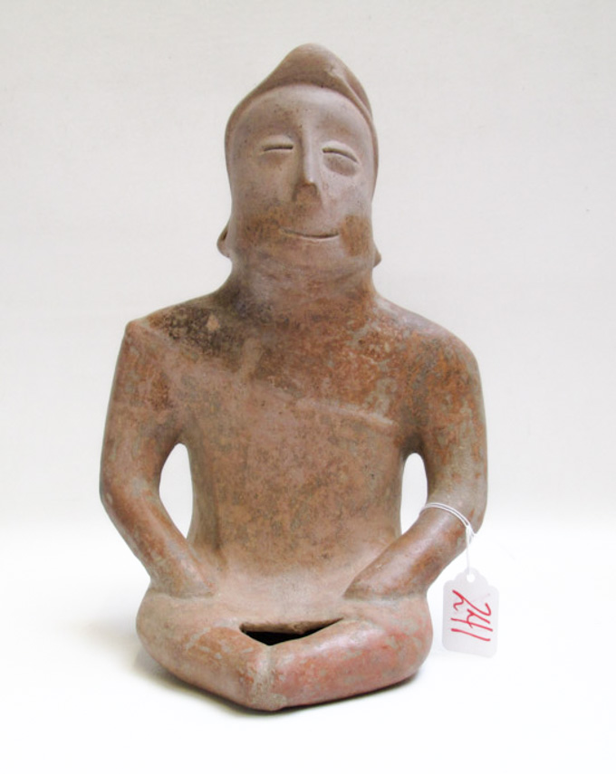 Appraisal: PRE-COLUMBIAN STYLE FIGURAL POTTERY VESSEL seated figure having an opening