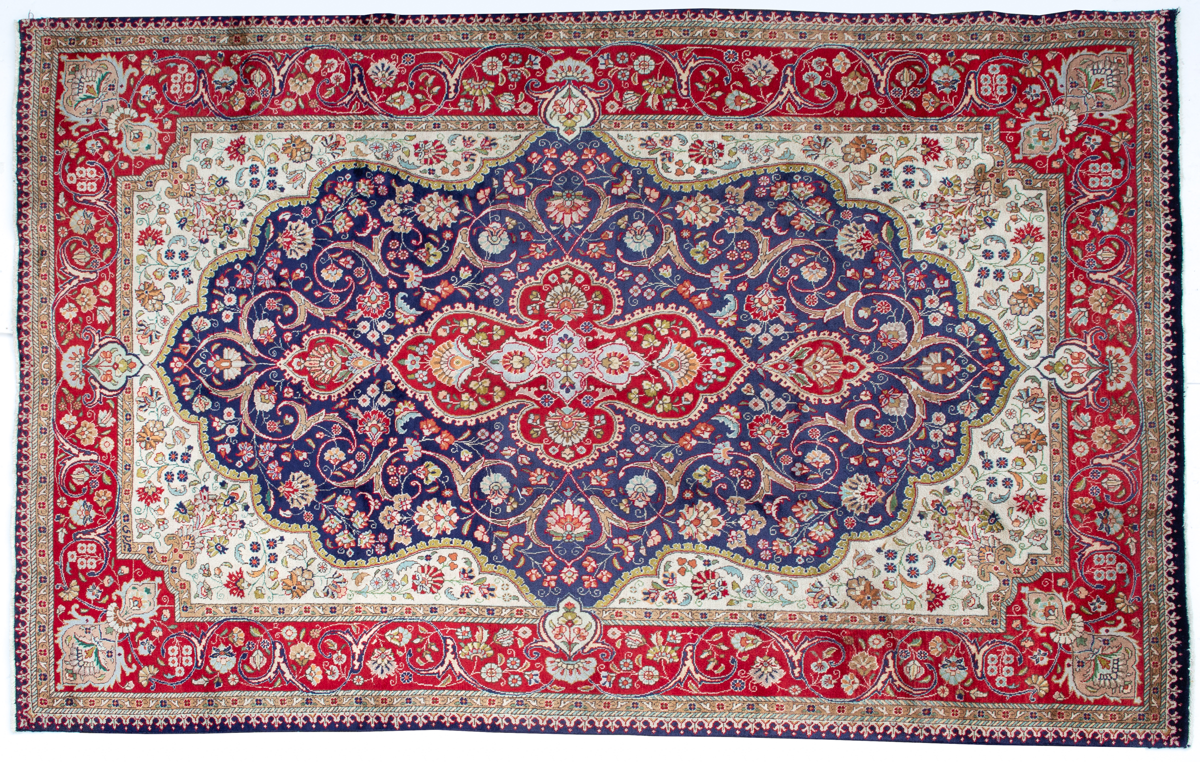 Appraisal: A Tabriz blue ground rug with stylised foliage cm x