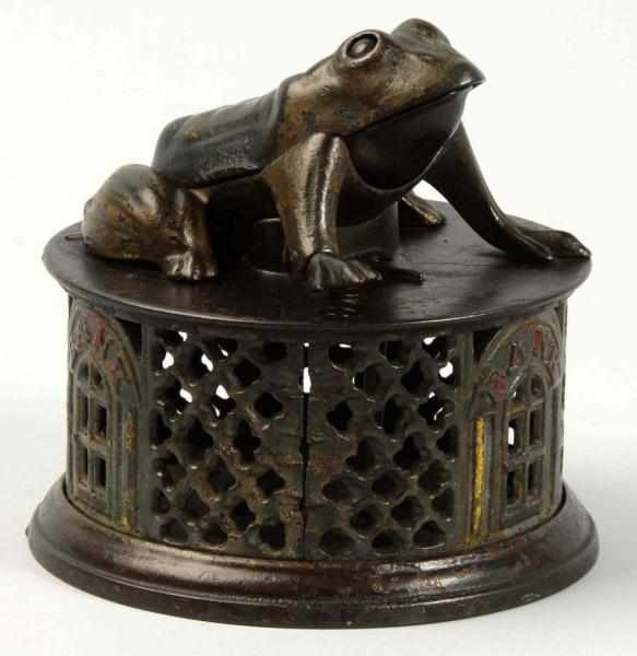 Appraisal: Cast Iron Frog on Base Mechanical Bank Description Patented Manufactured