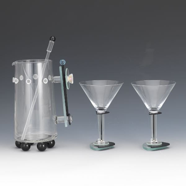 Appraisal: GEORGE PONZINI GLASS PITCHER AND MARTINI GLASSES Neo Deco martini