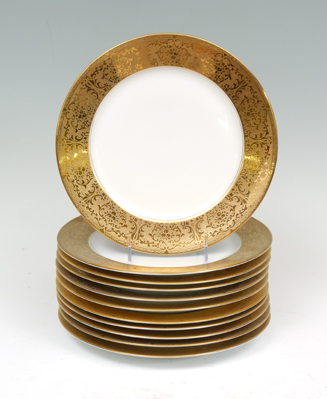 Appraisal: BOHEMIA CZECH SERVICE PLATES Embossed gold rim marked Bohemia Made