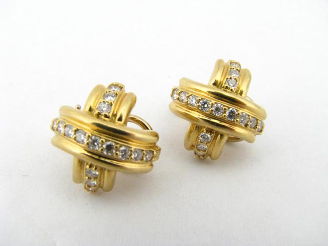 Appraisal: Tiffany K yellow gold diamond earrings diamonds in each earring