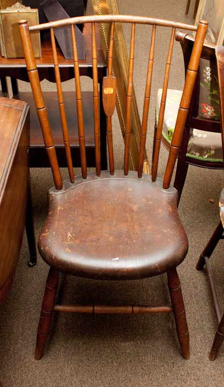 Appraisal: American elm spindle-back Windsor chair Estimate - No condition report