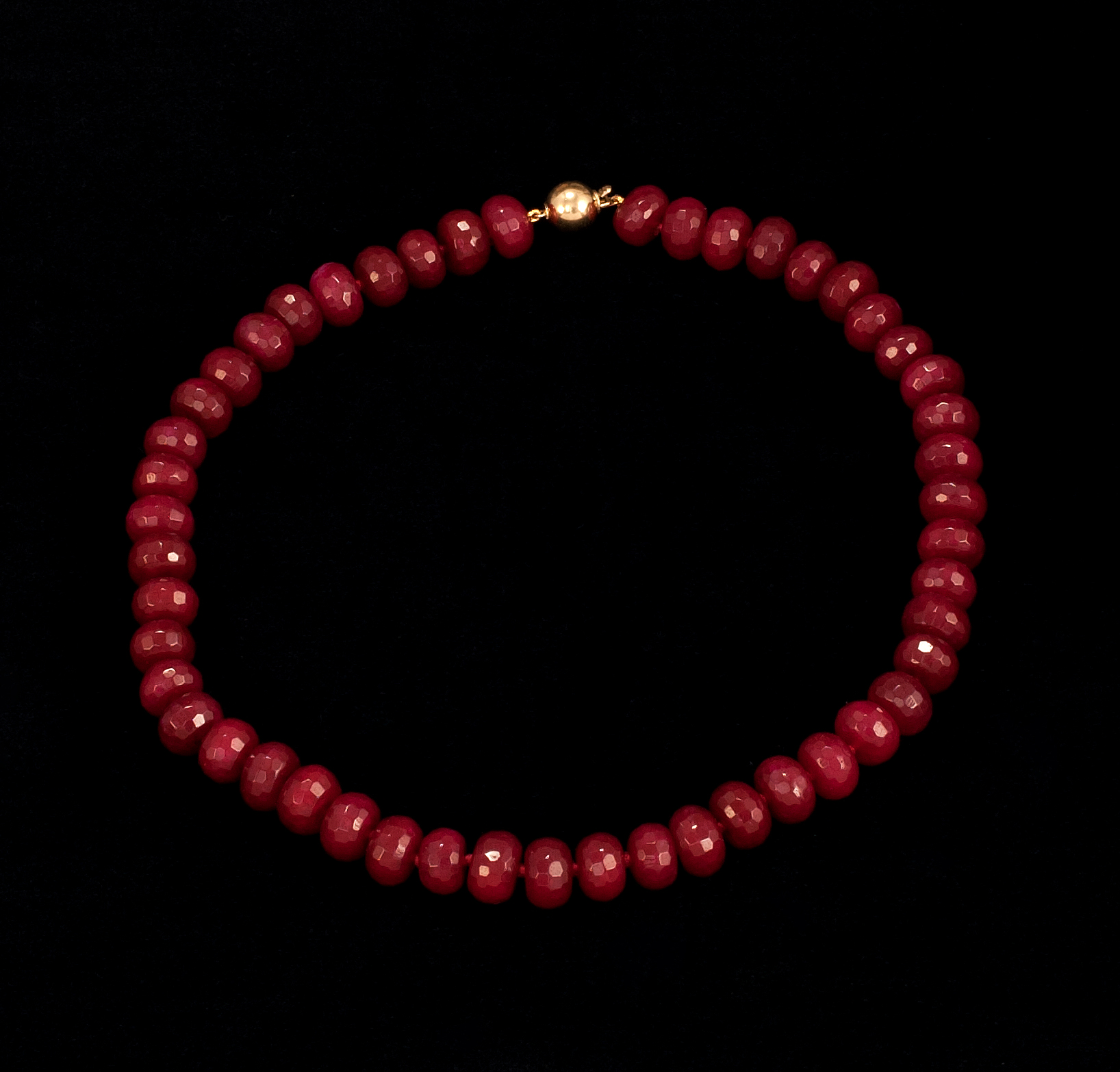 Appraisal: FACETED RUBY BEAD NECKLACE With kt yellow gold clasp Length