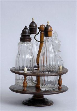 Appraisal: VICTORIAN FRUITWOOD AND IVORY-MOUNTED ROSEWOOD CRUET FRAME WITH FOUR GLASS