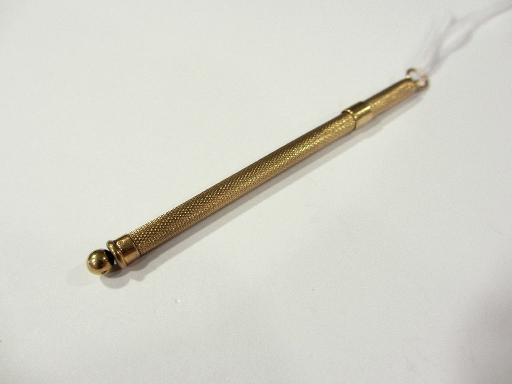 Appraisal: A ct gold swizzle stick all over engine engraved Birmingham