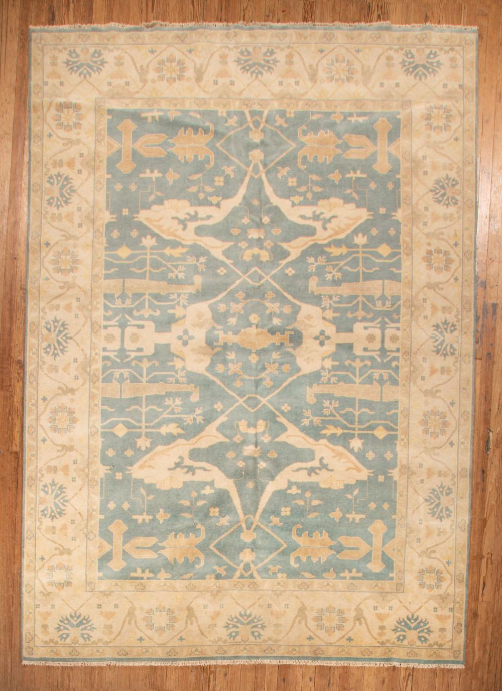 Appraisal: Persian Carpet blue and cream ground stylized foliate design ft