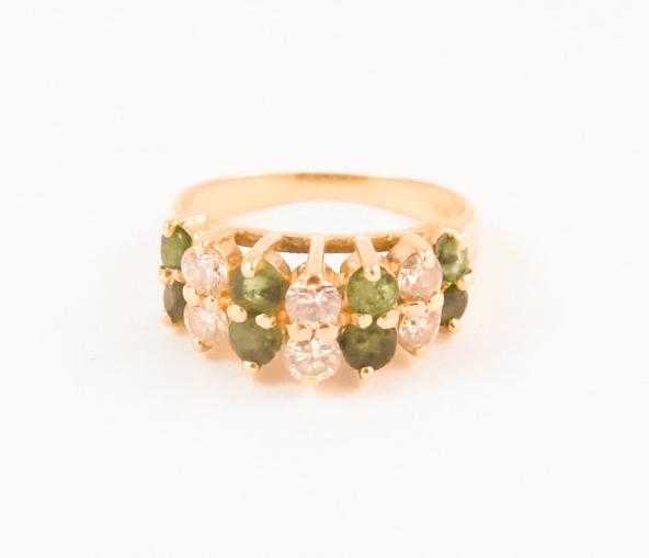 Appraisal: EMERALD DIAMOND AND FOURTEEN KARAT GOLD RING set with eight