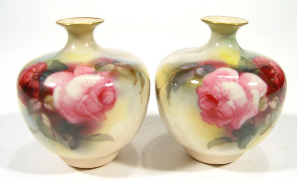 Appraisal: Pair of Royal Worcester blush ivory ground vases each hand