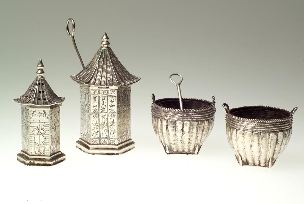 Appraisal: CHINESE SILVER CRUET SET comprising a mustard and pepperette each