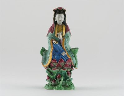 Appraisal: A Chinese famille rose figure of Guanyin seated on an