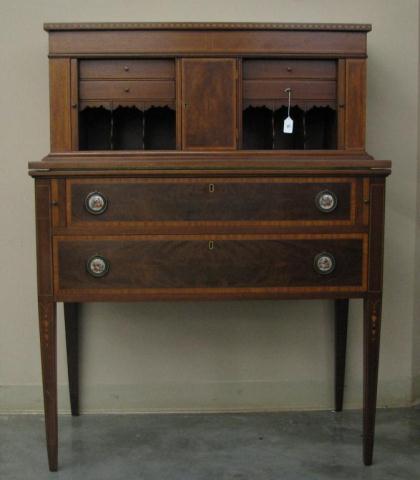 Appraisal: A vintage Federal Style mahogany tambour desk with mahogany veneer