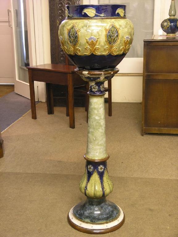 Appraisal: A Royal Doulton glazed stoneware jardiniere on pedestal jardiniere moulded