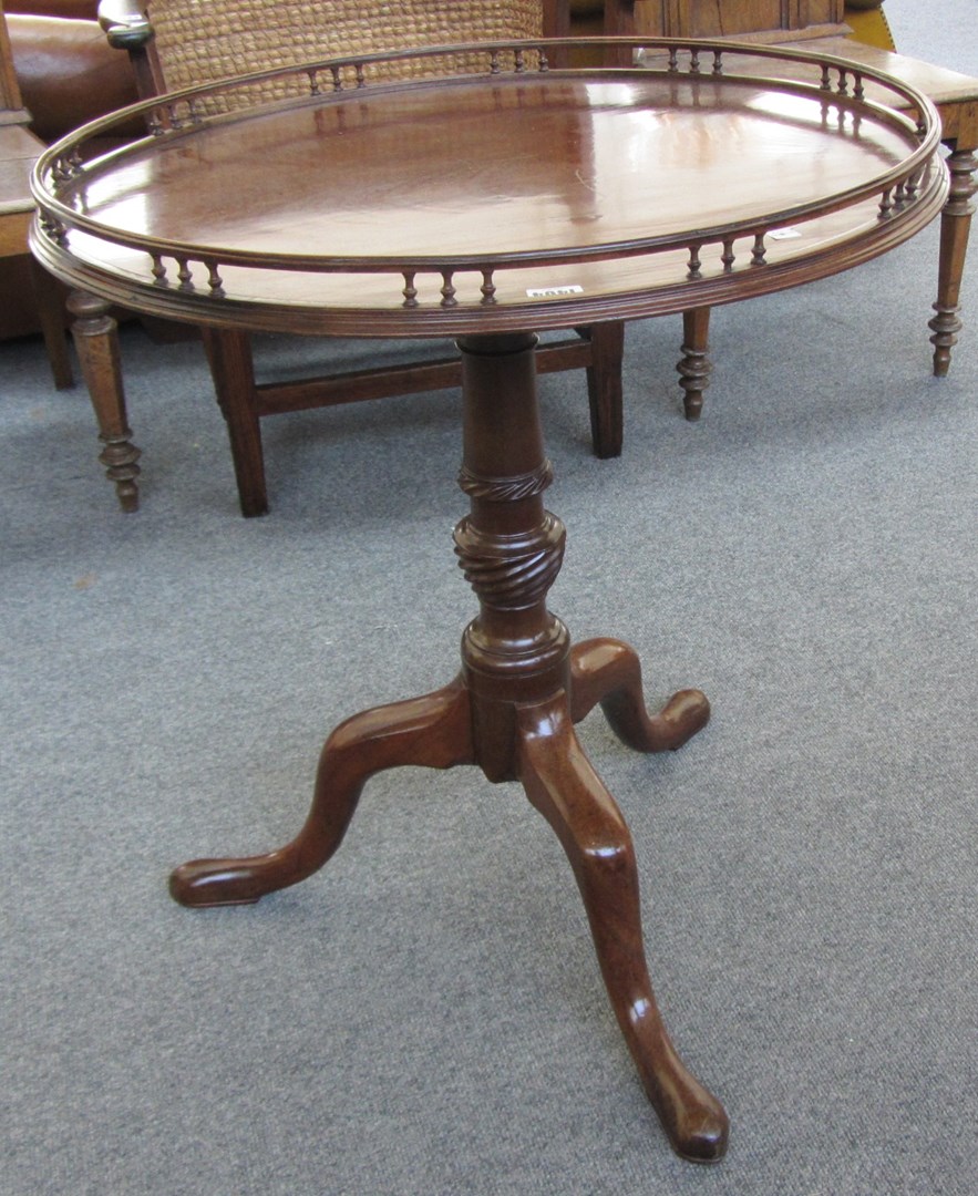 Appraisal: A George III mahogany snap top tripod occasional table with