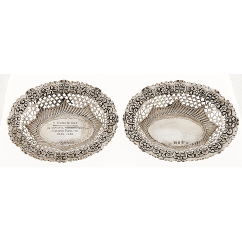 Appraisal: A pair of Victorian oval pierced and die stamped silver