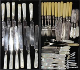 Appraisal: Assembled ivory and mother of pearl handled flatware lot of