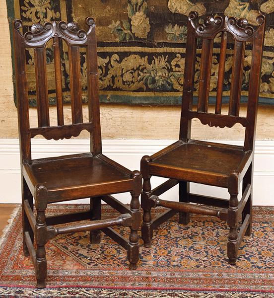 Appraisal: A PAIR OF TH CENTURY OAK HALL CHAIRS WITH SLAT