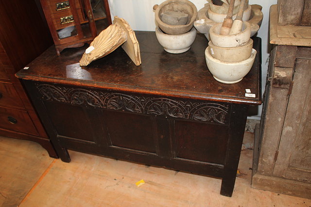 Appraisal: A TH OR TH CENTURY OAK COFFER with plank top