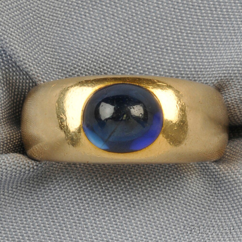 Appraisal: kt Gold and Sapphire Ring bezel-set with a cabochon sapphire