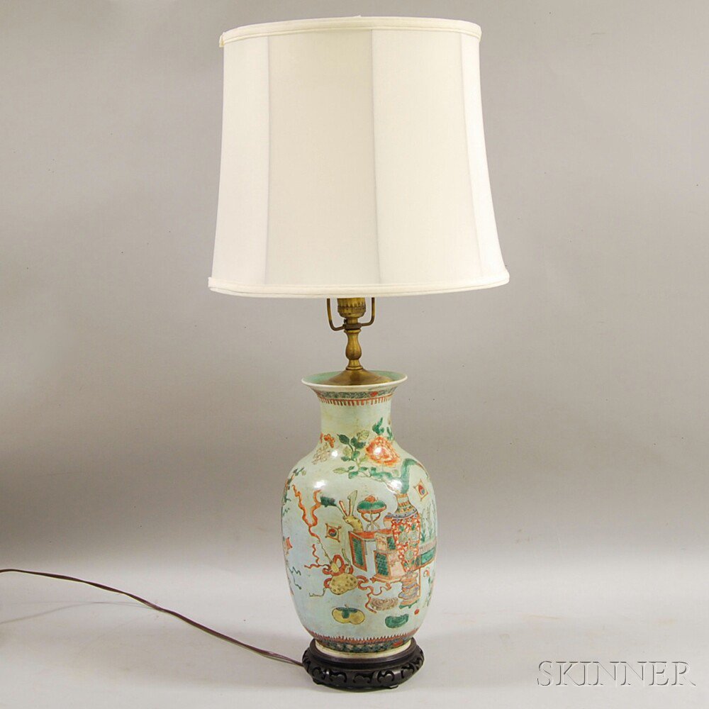 Appraisal: Chinese Polychrome Enameled Vase Mounted as a Lamp depicting a