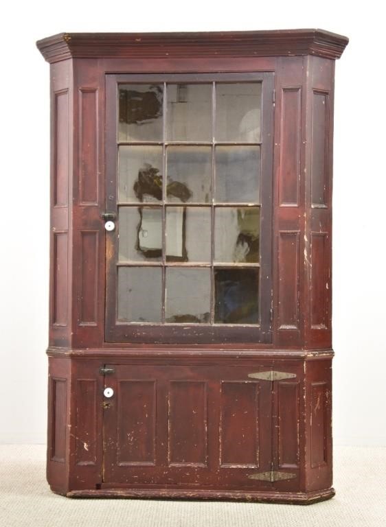 Appraisal: Pennsylvania paint decorated one piece corner cupboard early th c