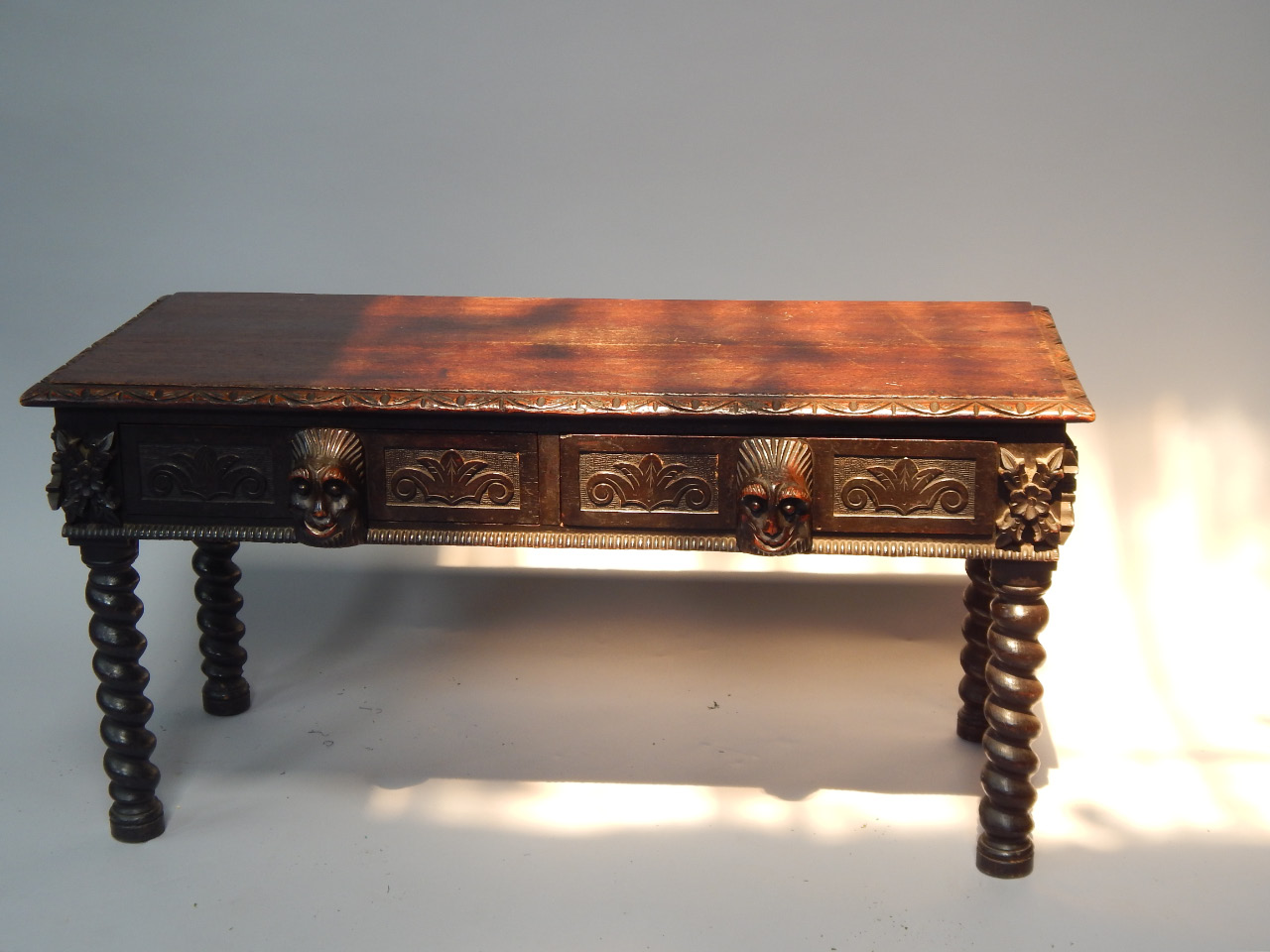 Appraisal: A Victorian oak side table having two frieze drawers with