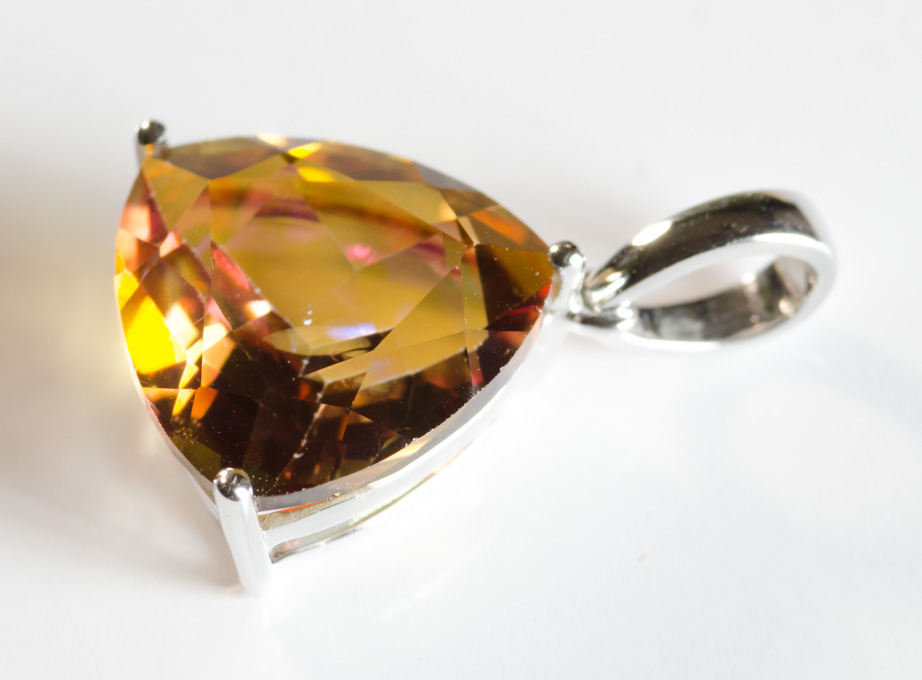 Appraisal: TWILIGHT TOPAZ AND FOURTEEN KARAT GOLD PENDANT The white gold