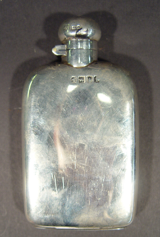 Appraisal: Rectangular silver hip flask with twist lid London cm high