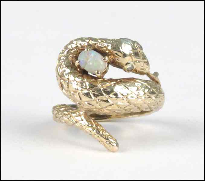 Appraisal: KARAT YELLOW GOLD AND OPAL SNAKE FORM RING grams Condition