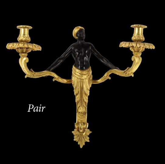 Appraisal: Pair of French Bronze-Patinated and Gilded Brass Two-Light Blackamoor Appliques