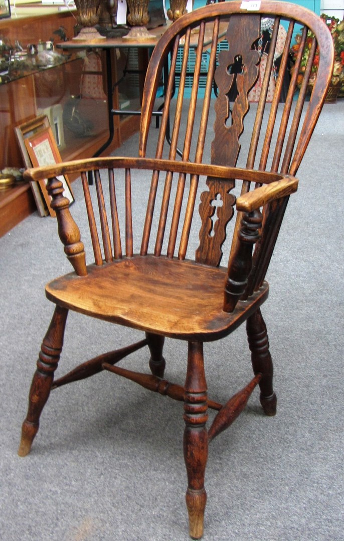 Appraisal: A th century ash and elm stick back Windsor armchair