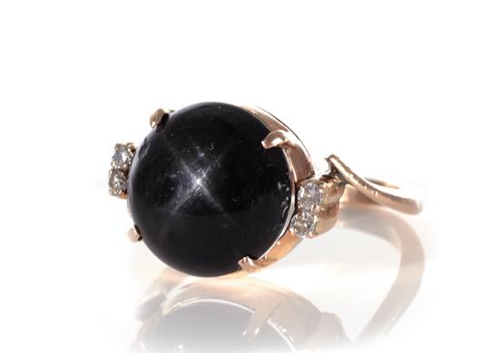 Appraisal: Black star tourmaline and diamond ring x x mm cabochon