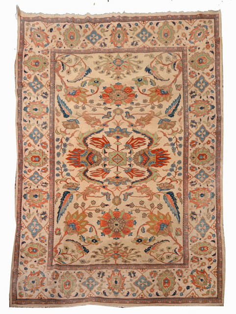 Appraisal: A ZIEGLER PASTEL GROUND CARPET decorated a central medallion within