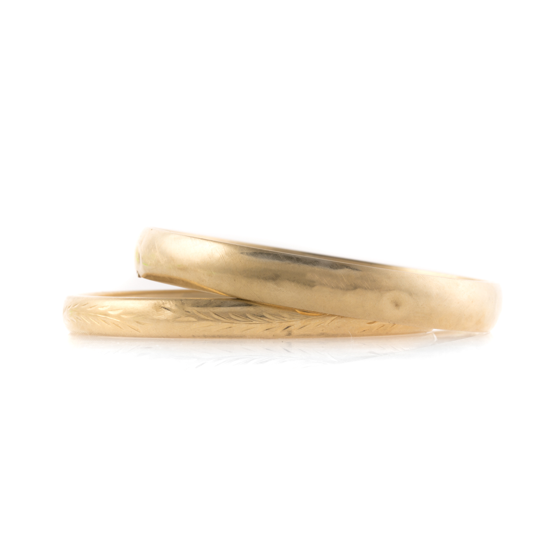 Appraisal: A Pair of K Yellow Gold Hinged Bangle Bracelets K