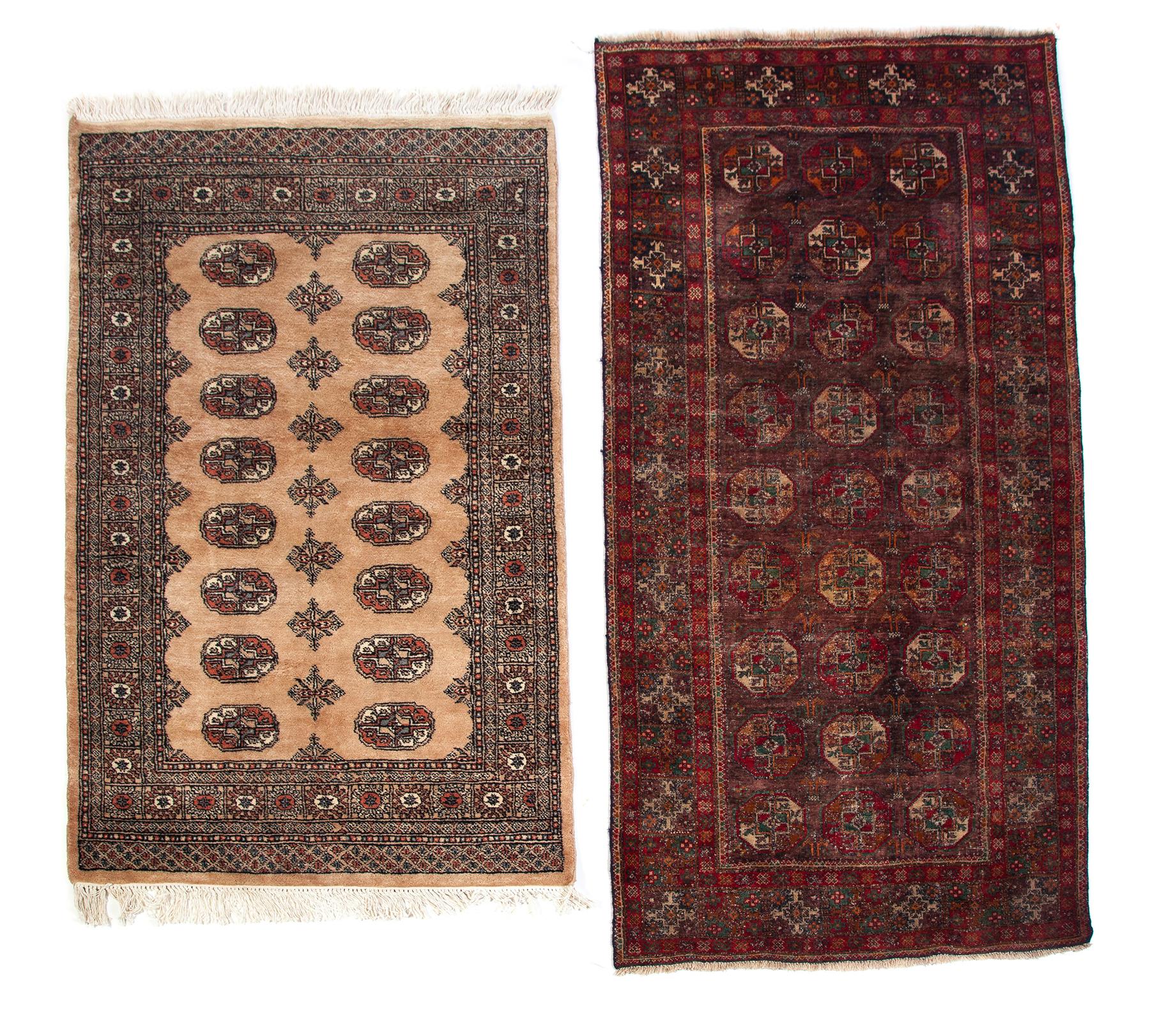 Appraisal: TWO ORIENTAL AREA RUGS Twentieth century Bokhara with beige field