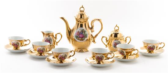 Appraisal: Sale Lot An Austrian Gilt and Painted Porcelain Tea Service