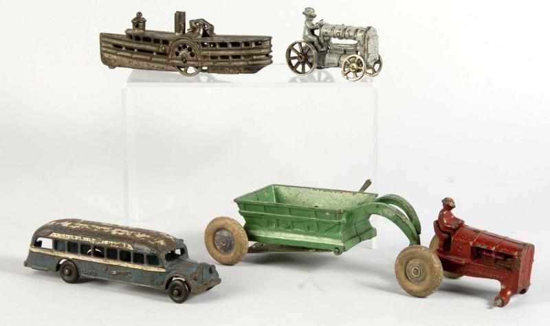 Appraisal: Lot of Cast Iron Vehicle Toys Description American Various makers