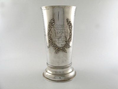 Appraisal: A Victorian presentation silver vase tapering circular form applied with