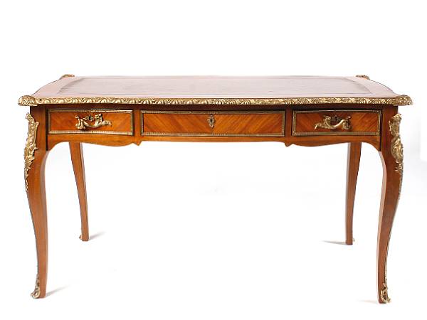 Appraisal: A Louis XV style gilt bronze mounted walnut bureau plat