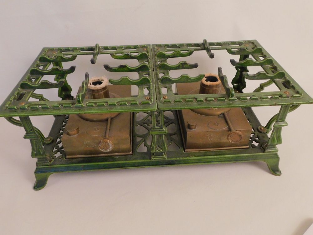 Appraisal: FRENCH ENAMEL DOUBLE BURNER RANGE Unusual and fancy old green