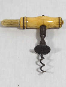 Appraisal: A late th century bone handled steel corkscrew with brush