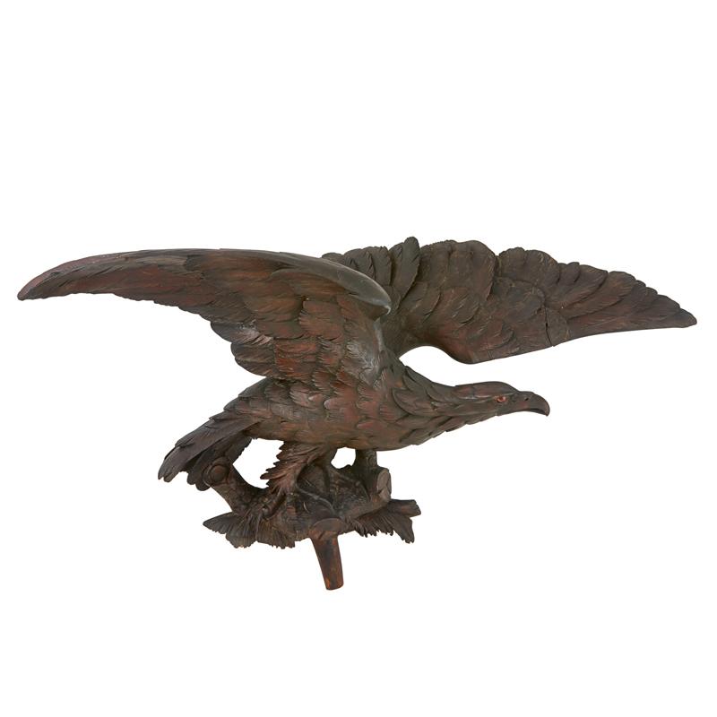 Appraisal: BLACK FOREST WOOD-CARVED EAGLE Ebonized with glass eyes late th