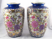 Appraisal: A pair of Chinese ceramic vases with panels of flowers