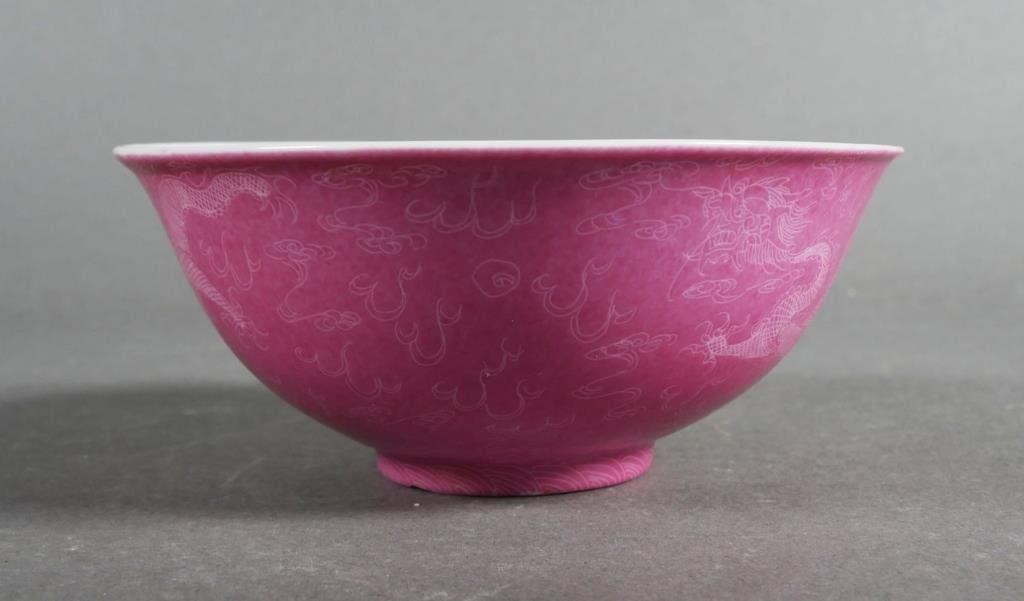 Appraisal: Pink ground with etched sgraffito surface of dragon design Guangxu