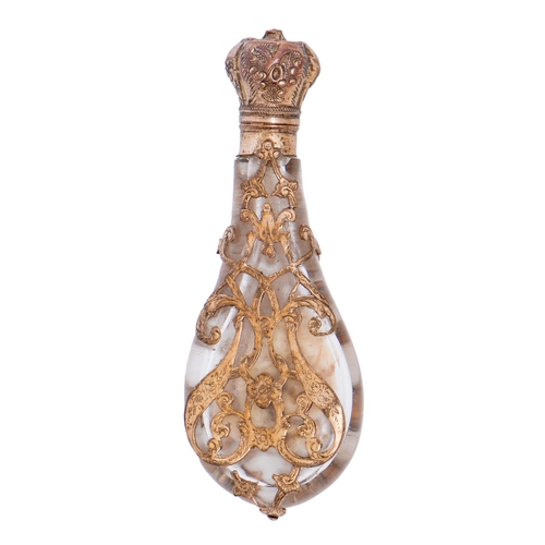 Appraisal: A French engraved gilt brass and glass cagework scent bottle