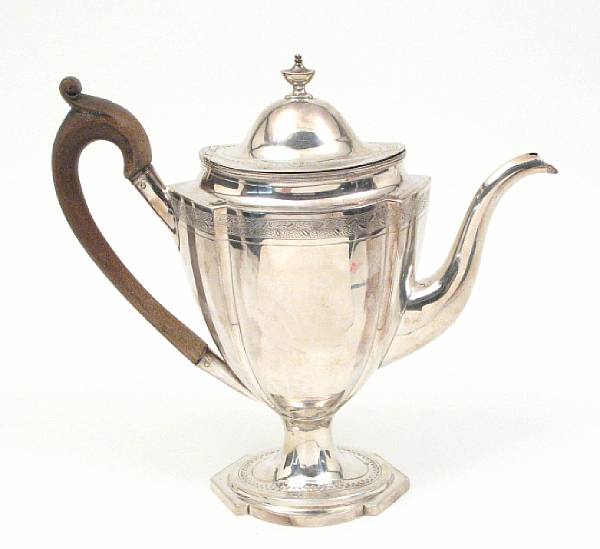 Appraisal: A George III silver coffee pot with wooden handleSolomon Hougham