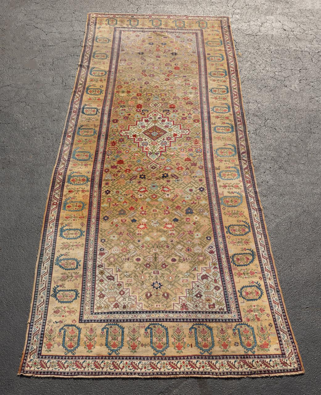 Appraisal: ANTIQUE HAND KNOTTED CAUCASIAN RUG ' X ' Antique hand