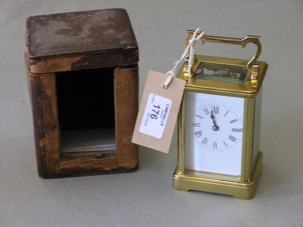 Appraisal: A carriage clock with enamel dial compensated balance and two