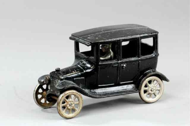 Appraisal: ARCADE MODEL 'T' FOUR DOOR SEDAN Cast iron painted in